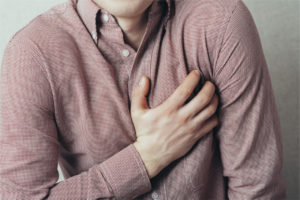 man with chest pain stress